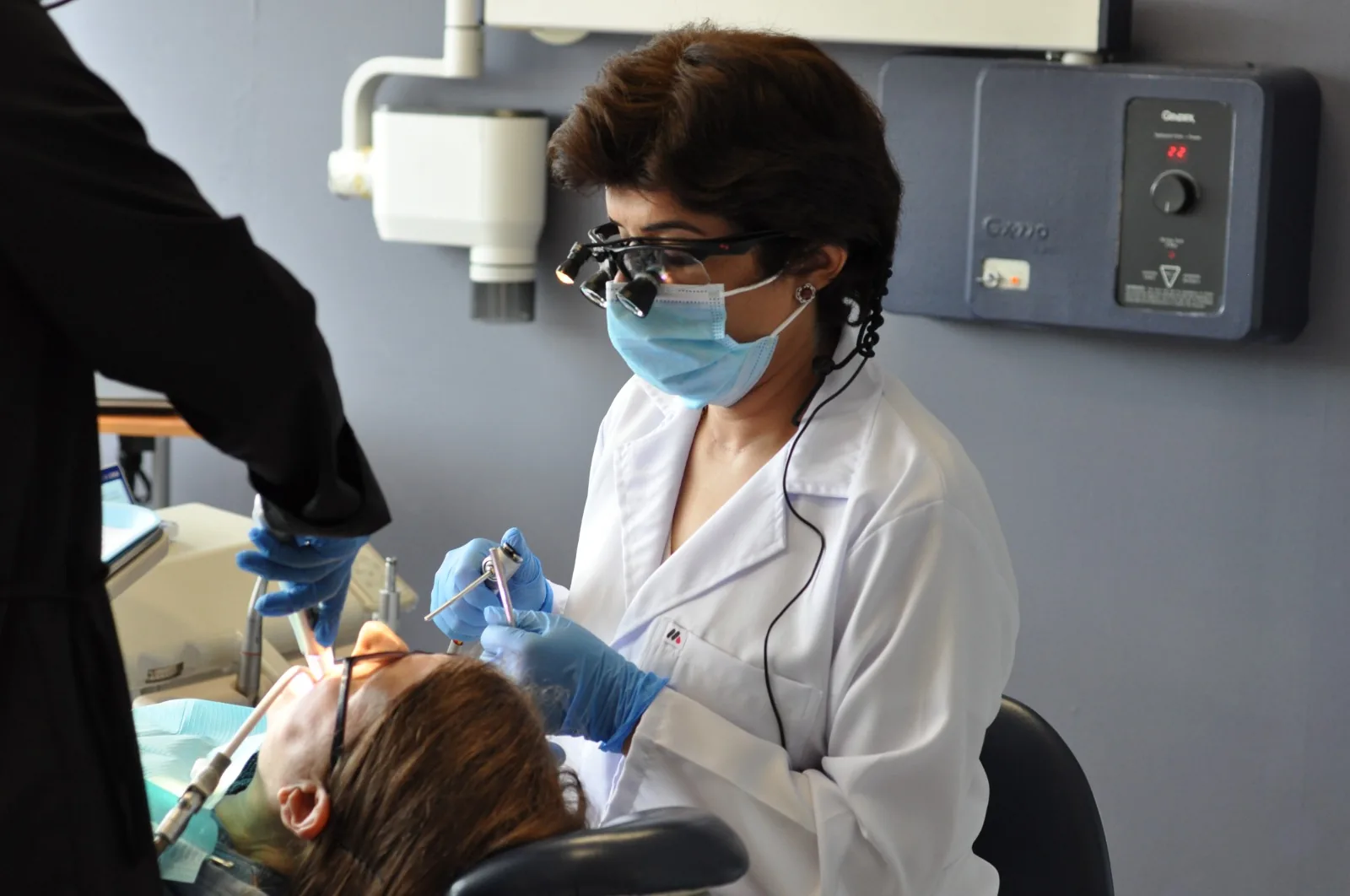 Dr. Sabeen Tiwana providing dental treatment