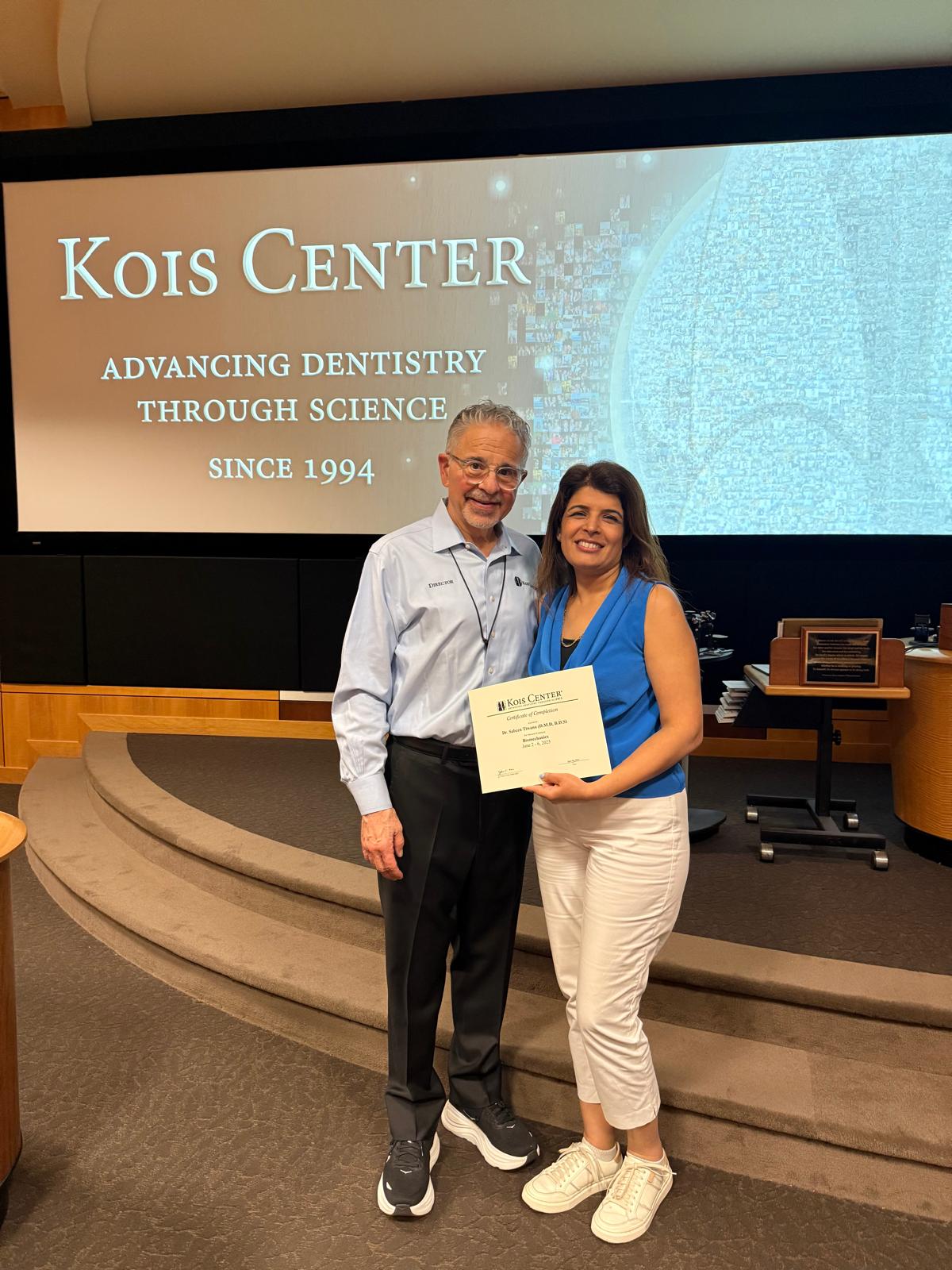 Dr. Sabeen Tiwana receiving her Kois Center certificate of completion